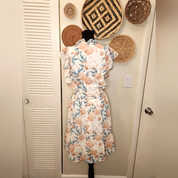 LAST ONE! Floral Mini Dress With Flutter Sleeves - Picture 9 of 12